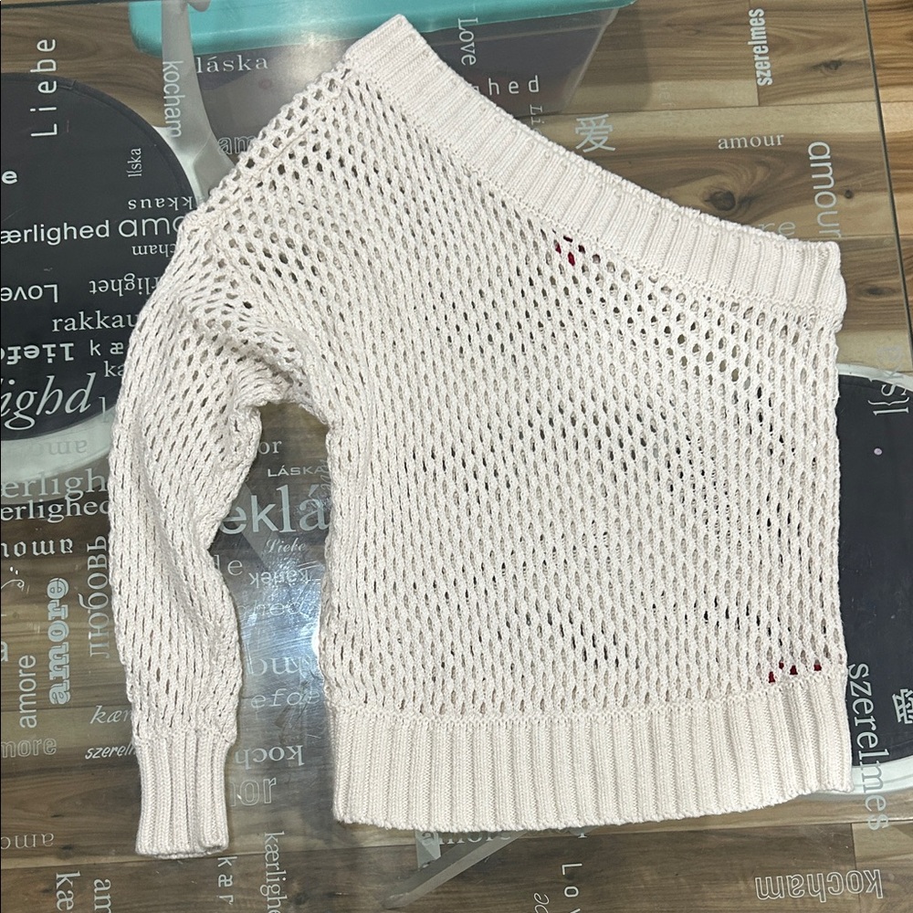 Jennifer Lopez Off-Shoulder Knit Sweater in Cream
